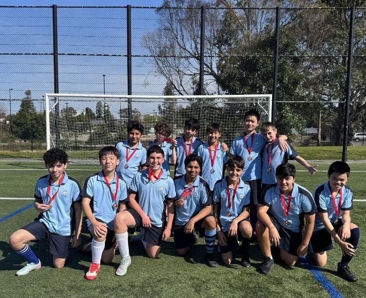 An image of our students after a game of soccer.
